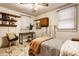Small bedroom with double bed and built-in shelves at 1708 S Randolph St, Indianapolis, IN 46203