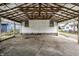 Covered carport providing parking space at 1708 S Randolph St, Indianapolis, IN 46203