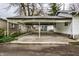 Covered carport with concrete parking area at 1708 S Randolph St, Indianapolis, IN 46203