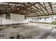 Covered carport with parking space and view of neighborhood at 1708 S Randolph St, Indianapolis, IN 46203