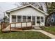 White house with porch, ramp, and small yard at 1708 S Randolph St, Indianapolis, IN 46203
