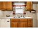 Kitchen sink and oak cabinets with a window at 1708 S Randolph St, Indianapolis, IN 46203