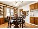 Bright kitchen with oak cabinets, white appliances, and a dining area at 1708 S Randolph St, Indianapolis, IN 46203