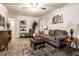 Living room with grey sofa and patterned arm chair at 1708 S Randolph St, Indianapolis, IN 46203