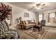 Living room with grey sofa and view of dining area at 1708 S Randolph St, Indianapolis, IN 46203