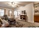Living room with grey sofa and access to dining area at 1708 S Randolph St, Indianapolis, IN 46203