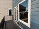 Private balcony with access from interior; features modern railing system at 2151 N College Ave, Indianapolis, IN 46202