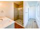 Elegant bathroom with a walk-in shower and double vanity at 2151 N College Ave, Indianapolis, IN 46202