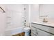 Clean bathroom with a bathtub, toilet and vanity at 2151 N College Ave, Indianapolis, IN 46202