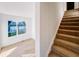 Bright office space with view and adjacent stairs leading upstairs at 2151 N College Ave, Indianapolis, IN 46202