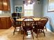 Kitchen dining area with wood table and chairs at 7106 Bay View Dr, Indianapolis, IN 46214