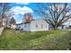 Large backyard with patio and trees at 8902 Carla Dr, Indianapolis, IN 46219