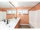 Modern bathroom with a double vanity and a shower/tub combo at 11736 Grazing Ln, Indianapolis, IN 46239