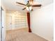 Bedroom with built-in shelving and a room divider at 11736 Grazing Ln, Indianapolis, IN 46239