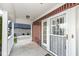 Front entrance with security door and white trim at 11736 Grazing Ln, Indianapolis, IN 46239