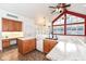 Spacious kitchen featuring an island, ample cabinetry, and updated appliances at 11736 Grazing Ln, Indianapolis, IN 46239