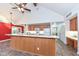 Kitchen with large island and white marble countertops at 11736 Grazing Ln, Indianapolis, IN 46239