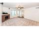 Living room featuring a brick fireplace, bay window and access to bathroom at 11736 Grazing Ln, Indianapolis, IN 46239