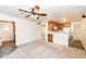 Open concept living room with kitchen and bathroom access at 11736 Grazing Ln, Indianapolis, IN 46239