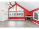 Living room with vaulted ceiling, fireplace and hardwood floors at 11736 Grazing Ln, Indianapolis, IN 46239
