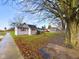 Exterior view of the house with sidewalk and tree at 31 S Superior St, Orestes, IN 46063
