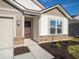 Front exterior of a new construction home with stone accents and a covered entryway at 3204 W Keepsake Ln, Monrovia, IN 46157