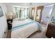 Main bedroom with double bed and ensuite bathroom access at 4355 E Streacher Rd, Bloomington, IN 47408