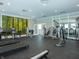 Fitness center featuring modern equipment and forest-themed wall at 6322 Granby Dr, Whitestown, IN 46075