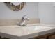 Basement bathroom vanity with a modern sink and faucet at 1010 Redwing Dr, Columbus, IN 47203