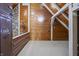 Large attic bedroom with wood walls and beamed ceiling at 1155 Cope Rd, Martinsville, IN 46151