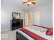 Bright bedroom with dresser and comfortable queen bed at 12954 Water Ridge Dr, Fishers, IN 46055