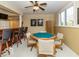 Basement game area featuring an octagonal game table and seating at 12954 Water Ridge Dr, Fishers, IN 46055