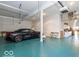 Finished garage with epoxy floor and car at 12954 Water Ridge Dr, Fishers, IN 46055