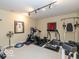 Basement home gym with various exercise equipment at 12954 Water Ridge Dr, Fishers, IN 46055