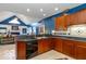 View of kitchen with island and living area at 12954 Water Ridge Dr, Fishers, IN 46055
