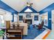 Sunroom with vaulted ceiling, fireplace, and built-in shelving at 12954 Water Ridge Dr, Fishers, IN 46055