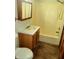 Clean bathroom with a tub, shower, and wood vanity at 239 Glenbrook Ln, Avon, IN 46123