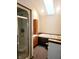 Bathroom with soaking tub, shower, and skylights at 239 Glenbrook Ln, Avon, IN 46123