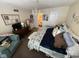 Bright bedroom with king-size bed and access to bathroom at 3250 Valley Farms Way, Indianapolis, IN 46214