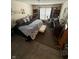 Spacious bedroom with king-size bed, sitting area, and ample closet space at 3250 Valley Farms Way, Indianapolis, IN 46214