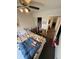 Bright bedroom with a double bed, walk-in closet, and ceiling fan at 3250 Valley Farms Way, Indianapolis, IN 46214
