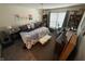 Spacious bedroom with king-size bed, sitting area, and ample closet space at 3250 Valley Farms Way, Indianapolis, IN 46214