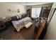Spacious bedroom with king-size bed, sitting area, and ample closet space at 3250 Valley Farms Way, Indianapolis, IN 46214