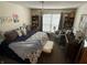 Spacious bedroom with king-size bed, sitting area, and ample closet space at 3250 Valley Farms Way, Indianapolis, IN 46214