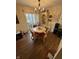 Bright dining area with wood floors and French doors at 3250 Valley Farms Way, Indianapolis, IN 46214