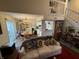 Open concept dining area with kitchen and living room views at 3250 Valley Farms Way, Indianapolis, IN 46214