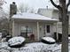 Condo exterior with snow-covered landscaping at 3250 Valley Farms Way, Indianapolis, IN 46214