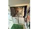 Stackable washer and dryer with shelving for storage at 3250 Valley Farms Way, Indianapolis, IN 46214