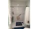 Clean shower with white subway tile and safety features at 3250 Valley Farms Way, Indianapolis, IN 46214