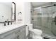 Modern bathroom with a large shower and gray tile at 430 N Park N Ave # 204, Indianapolis, IN 46202